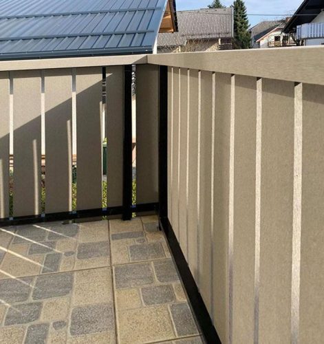 WPC balcony railing in grey with grey tiles